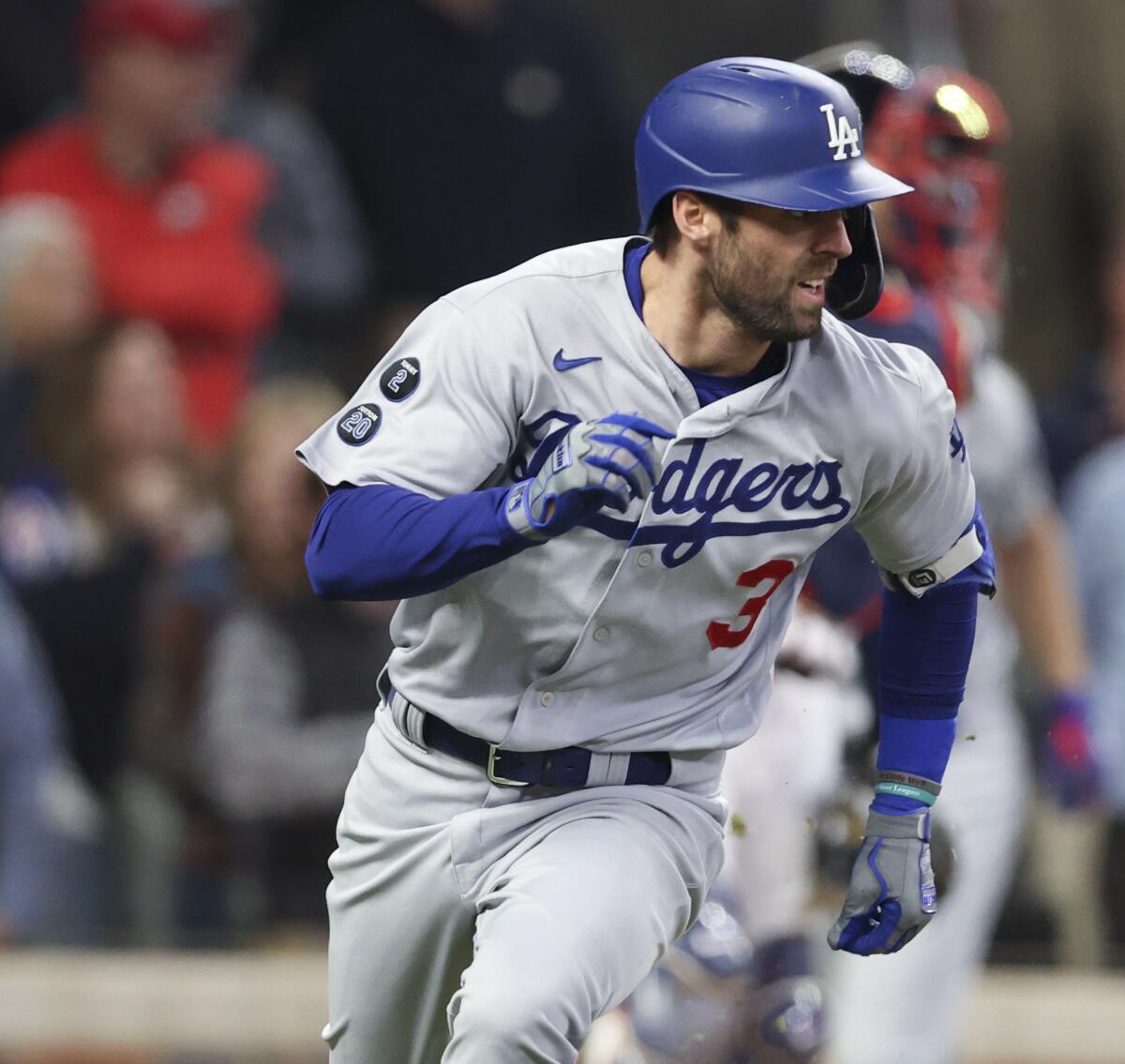Atlanta, GA - October 16: Los Angeles Dodgers' Chris Taylor runs to first after hitting an RBI single.