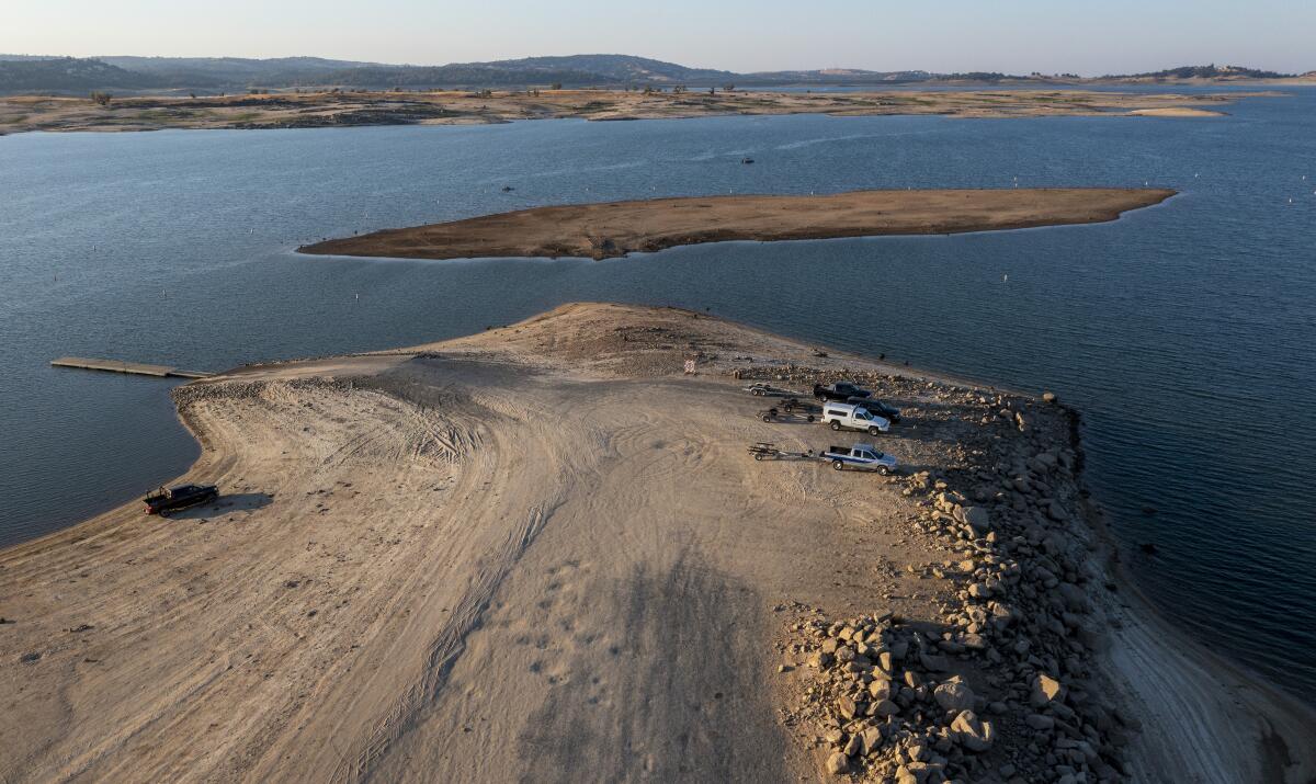 A peninsula is exposed as water levels recede at drought-stricken Folsom Lake in California.