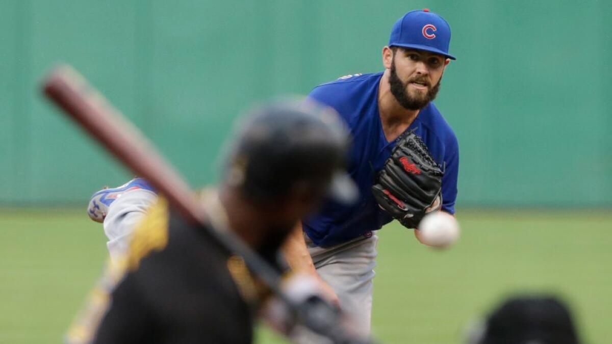 Cubs ace Jake Arrieta delivers a pitch against the Pirates during a game on July 8.