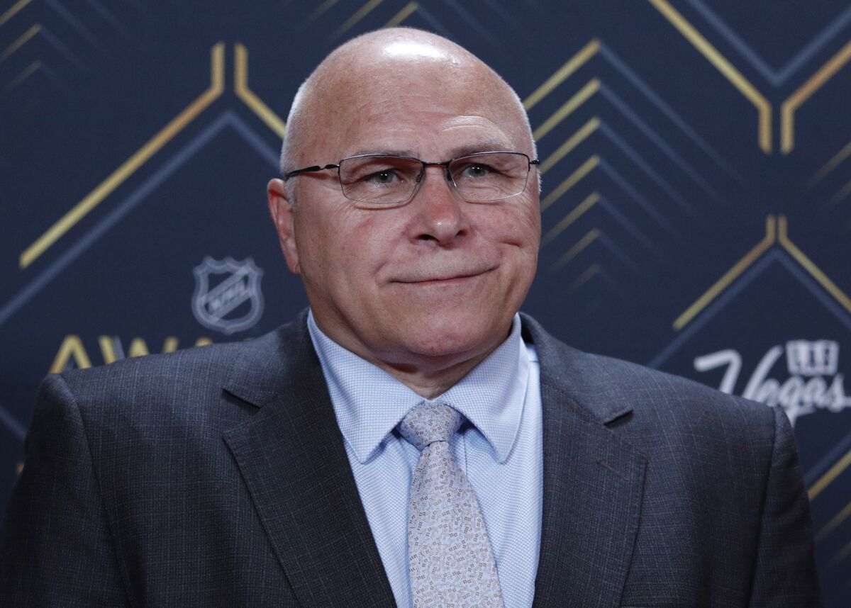 FILE - Barry Trotz of the New York Islanders poses on the red carpet before the NHL Awards, June 19, 2019, in Las Vegas. The New York Islanders have fired Barry Trotz after missing the playoffs in his fourth season with the team. General manager Lou Lamoriello made the surprising announcement Monday, May 9, 2022 more than a week after the regular season ended. Trotz had one year left on his five-year contract. (AP Photo/John Locher)