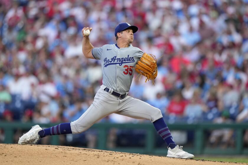 Los Angeles Dodgers' Gavin Stone pitches during the third inning of a baseball game against the Philadelphia Phillies, Wednesday, July 10, 2024, in Philadelphia. (AP Photo/Matt Slocum)