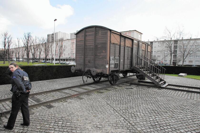 A railway car, shown in 2005, in the Paris suburb of Drancy commemorates the deportation of 76,000 Jews and others from France to Nazi concentration camps during World War II.