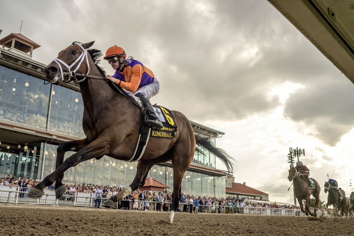 In this image provided by Hodges Photography, Kingsbarns with Flavien Prat aboard pulls away to win the 110th running of the $1,000,000 Grade II Louisiana Derby horse race , Saturday, March 25, 2023, at Fair Grounds race course in New Orleans. (Jamie Newell/Hodges Photography via AP)
