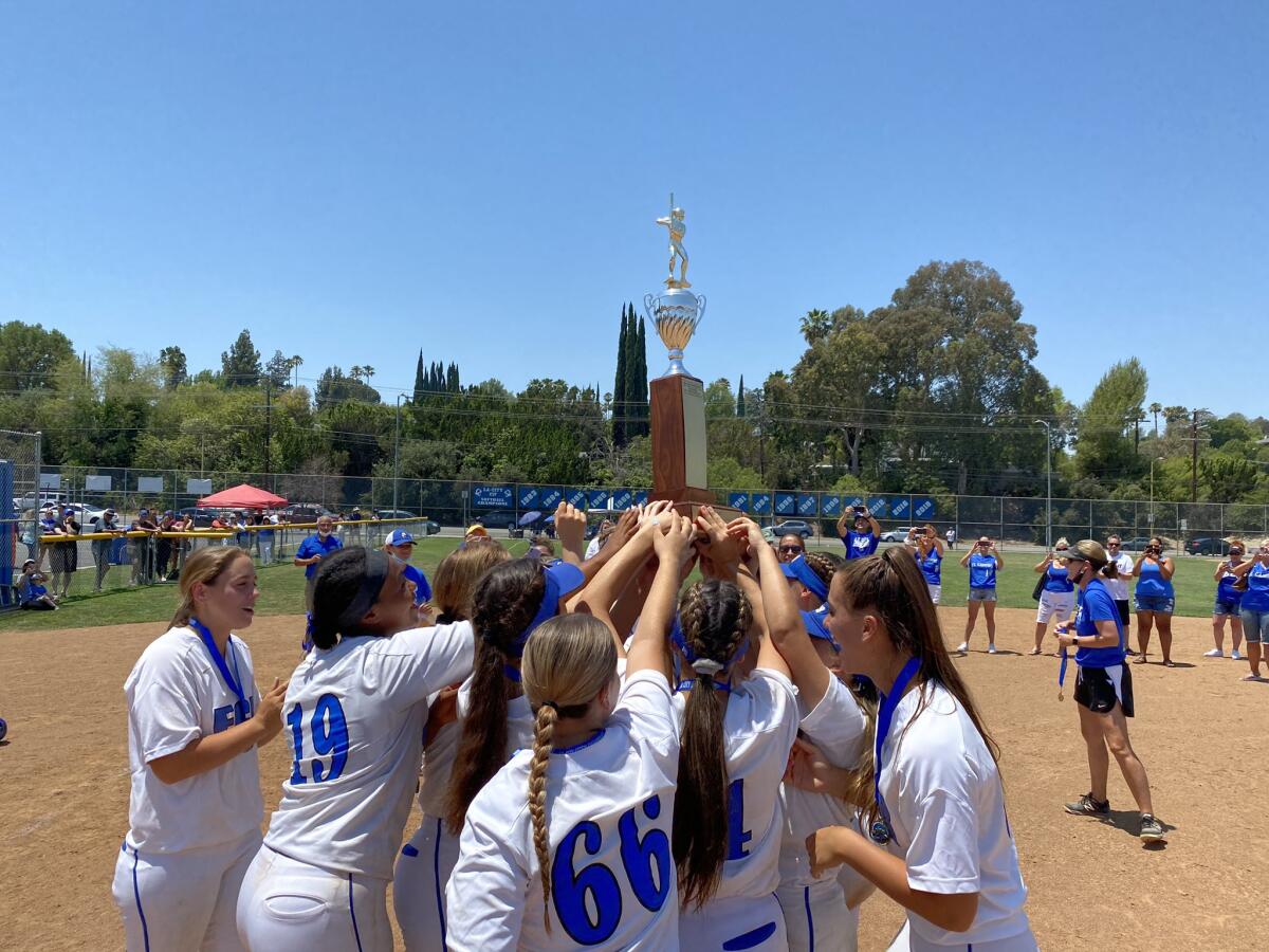 El Camino Real softball players celebrate a 17th City Section title.