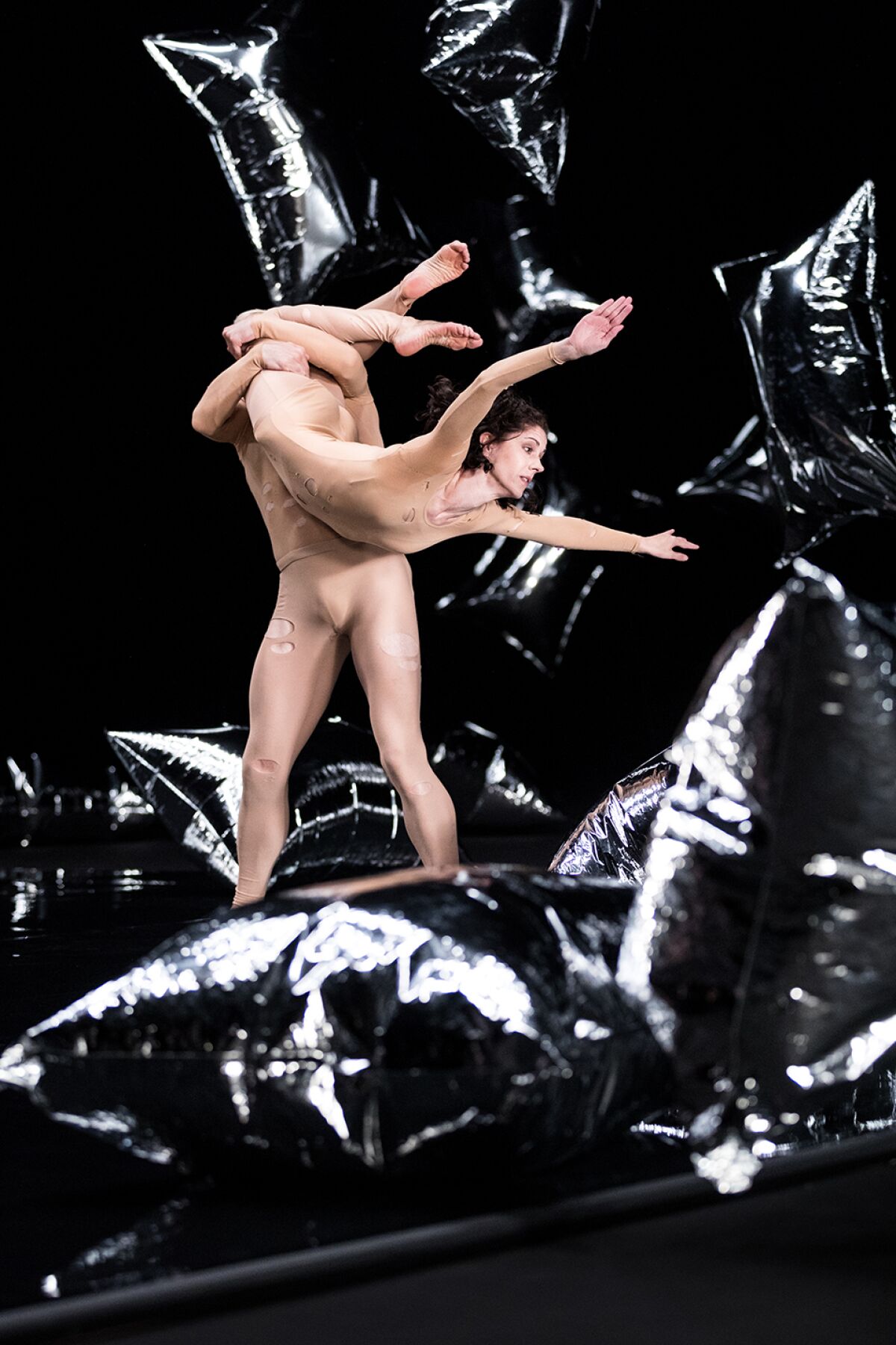 Jennifer Goggans and Brandon Collwes dance in RainForest
