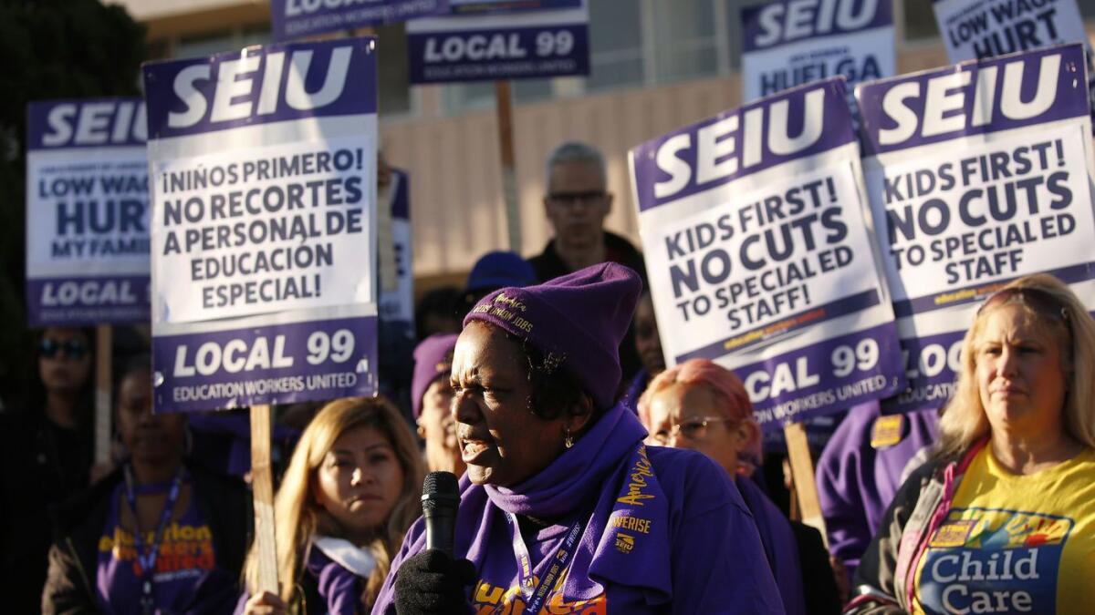 Nonteaching L.A. school district employees, including these who took part in a February protest, can now celebrate a new contract.