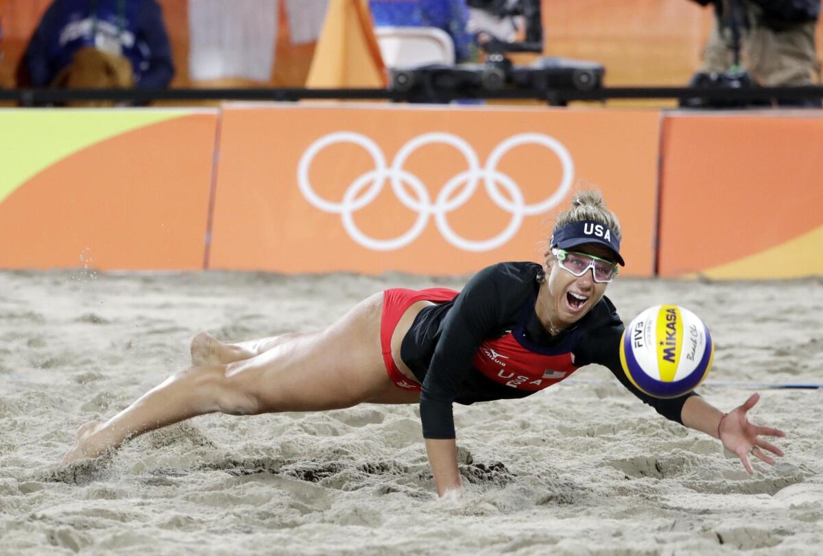 April Ross, a Costa Mesa resident and Newport Harbor High product, teamed with Kerri Walsh Jennings to win Wednesday and sweep their three Pool C matches. They advance to the round of 16.