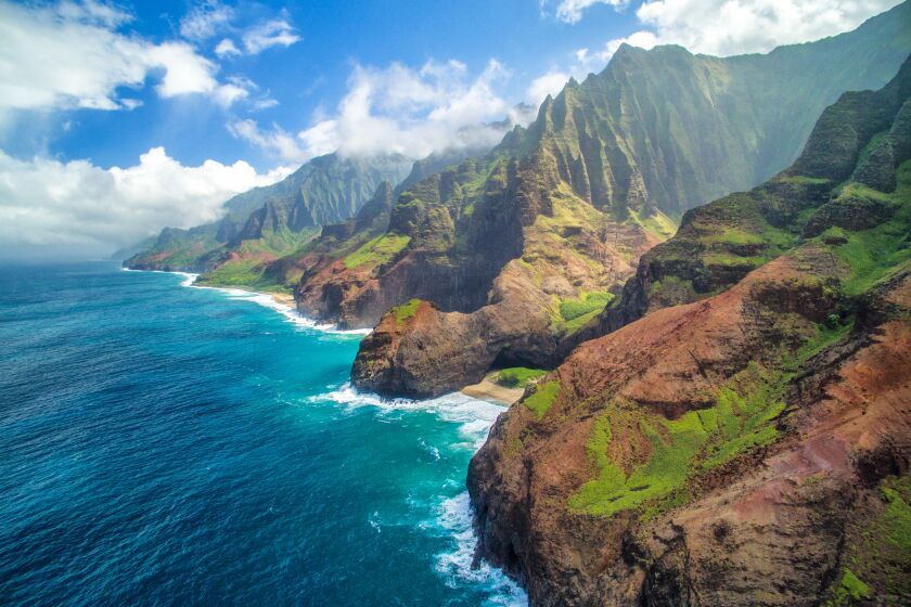 NAPALI COAST, KAUAI – 2016: Kauai’s famed Napali Coast is known for its towering cliffs up to 4000 feet high, dramatic valleys and scenic beaches.