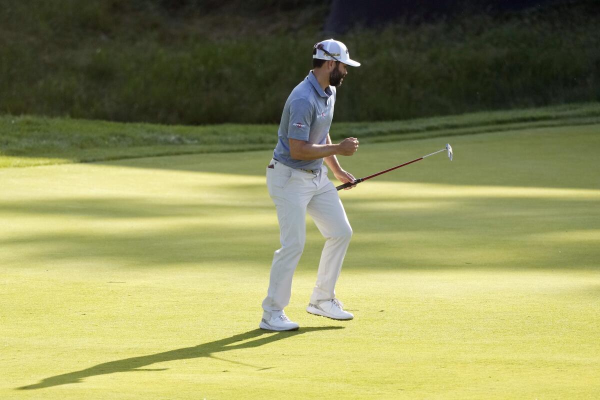 Adam Hadwin, of Canada, reacts after making a putt on the 13th hole during the first round of the U.S. Open golf tournament at The Country Club, Thursday, June 16, 2022, in Brookline, Mass. (AP Photo/Charlie Riedel)