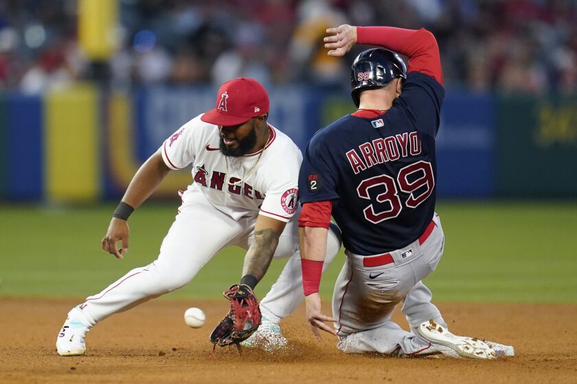 Boston Red Sox' Christian Arroyo (39) steals second base ahead of a throw to Los Angeles Angels second baseman Luis Rengifo, left, during the fifth inning of a baseball game in Anaheim, Calif., Monday, June 6, 2022. (AP Photo/Ashley Landis)