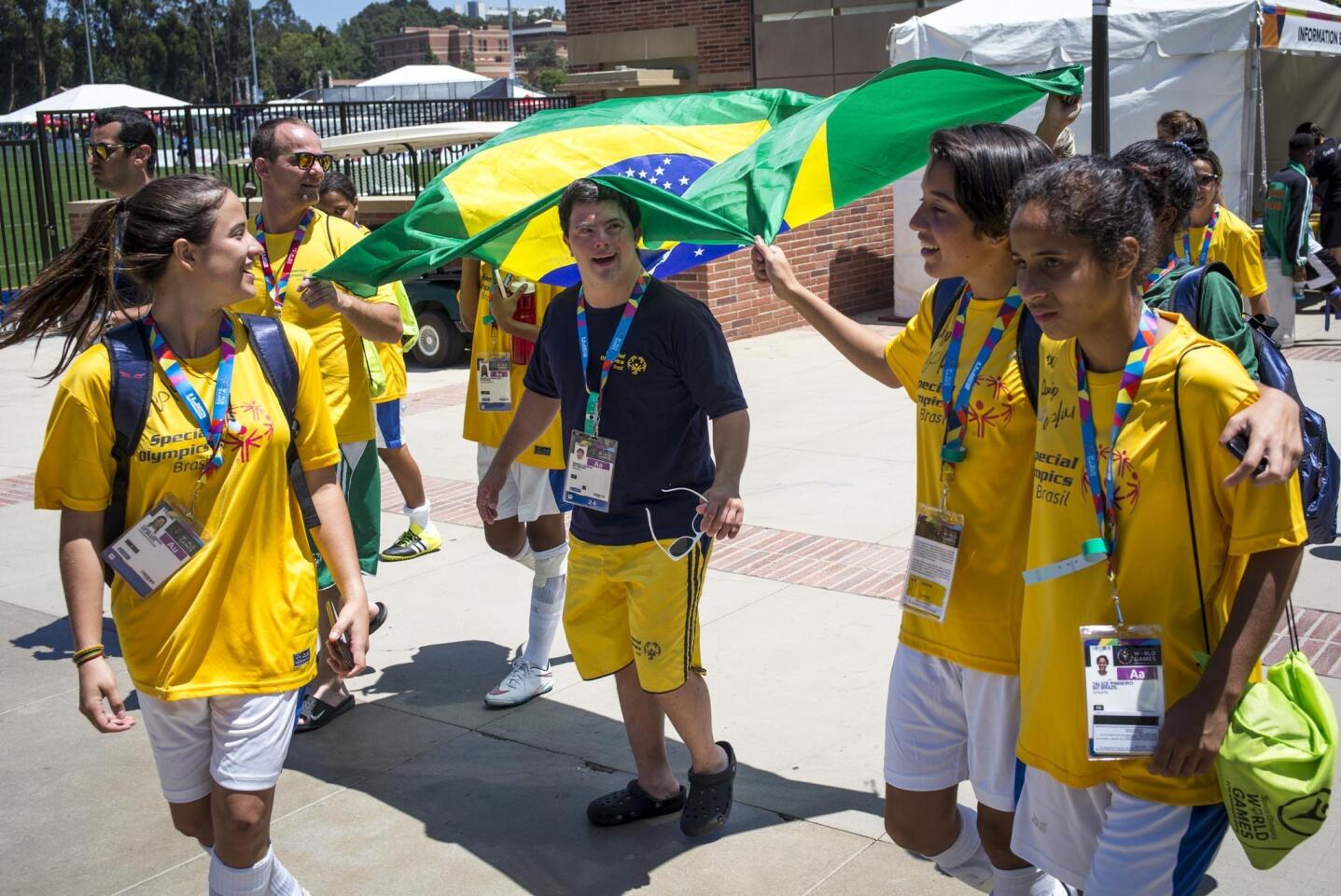 Athletes from Brazil carry their flag to their venue during the 2015 Special Olympic World Games at UCLA, Sunday, July 26, 2015, in Los Angeles. (David Crane/Los Angeles Daily News via AP) NO SALES; MAGS OUT; HILLS OUT, LOS ANGELES TIMES OUT; VENTURA COUNTY STAR OUT ANTELOPE VALLEY PRESS OUT; MANDATORY CREDIT