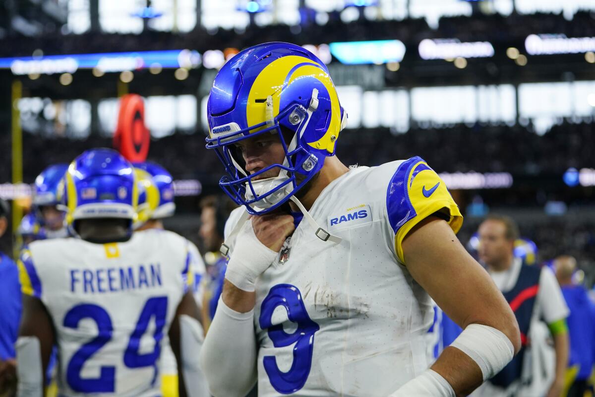 Rams quarterback Matthew Stafford wears a bandage after injuring his thumb against Dallas.