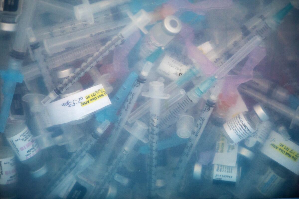 Used syringe and viles are disposed of in a safe container.