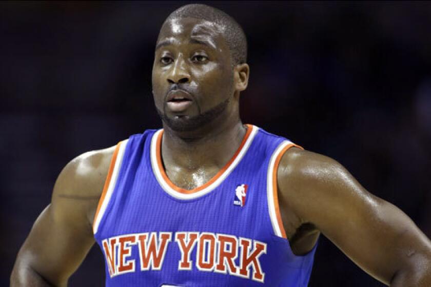 New York Knicks point guard Raymond Felton turned himself in to police early Tuesday morning.