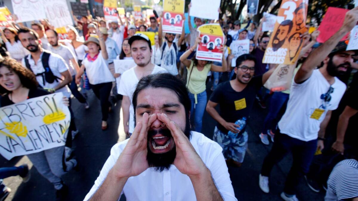 The disappearance of three film students in Guadalajara, in Mexico's Jalisco state, has prompted large and angry protests, like this one Saturday.