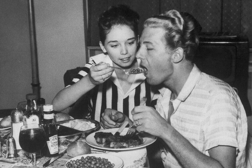American singer Jerry Lee Lewis and his 13-year-old bride, Myra Lewis, in a hotel in London in 1958.  