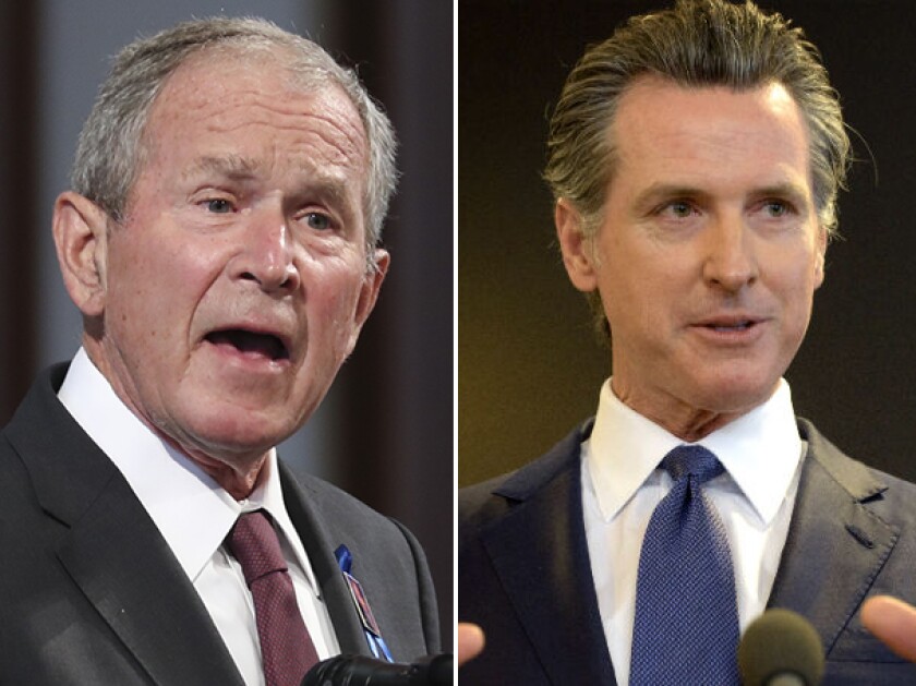 Former President George W. Bush, left, and California Governor Gavin Newsom