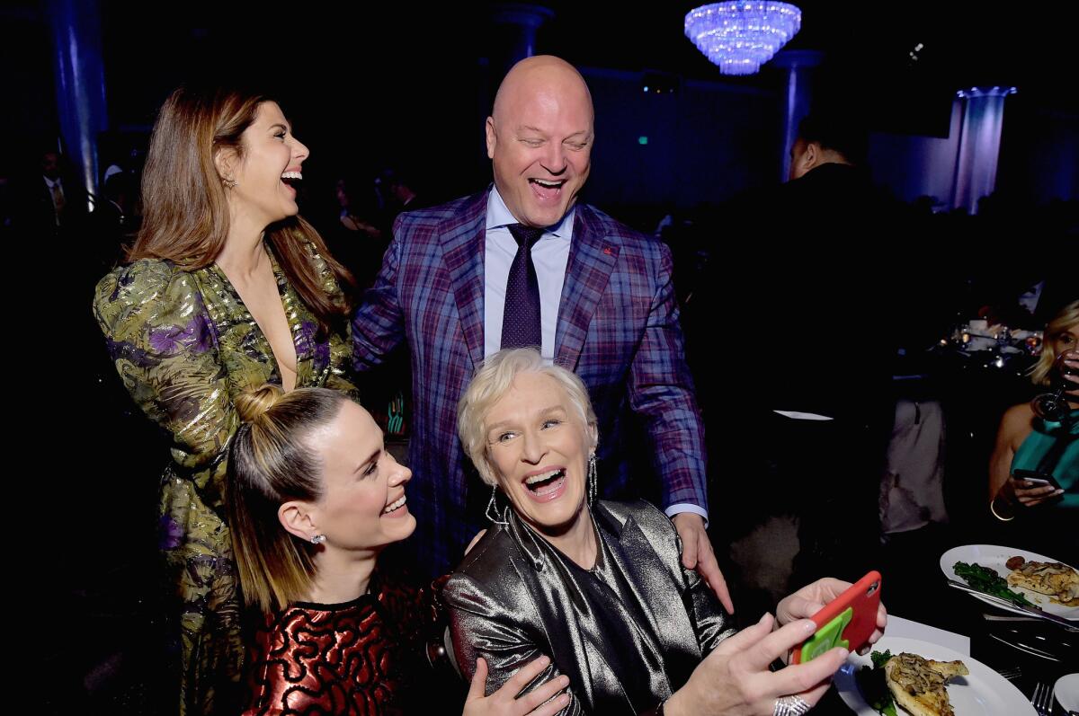 Marisa Tomei, clockwise from left, Michael Chiklis, honoree Glenn Close and Sarah Paulson at the 21st Costume Designers Guild Awards at the Beverly Hilton Hotel in Beverly Hills on Tuesday.