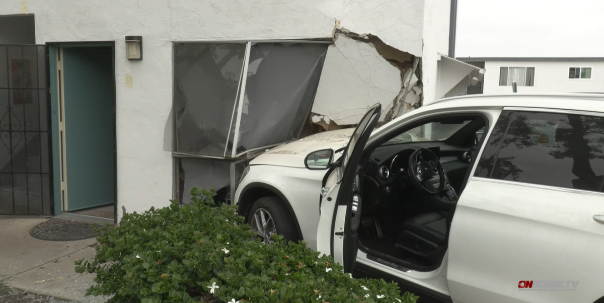 Ten residents were temporarily displaced from a National City apartment building after a motorist ran into it.