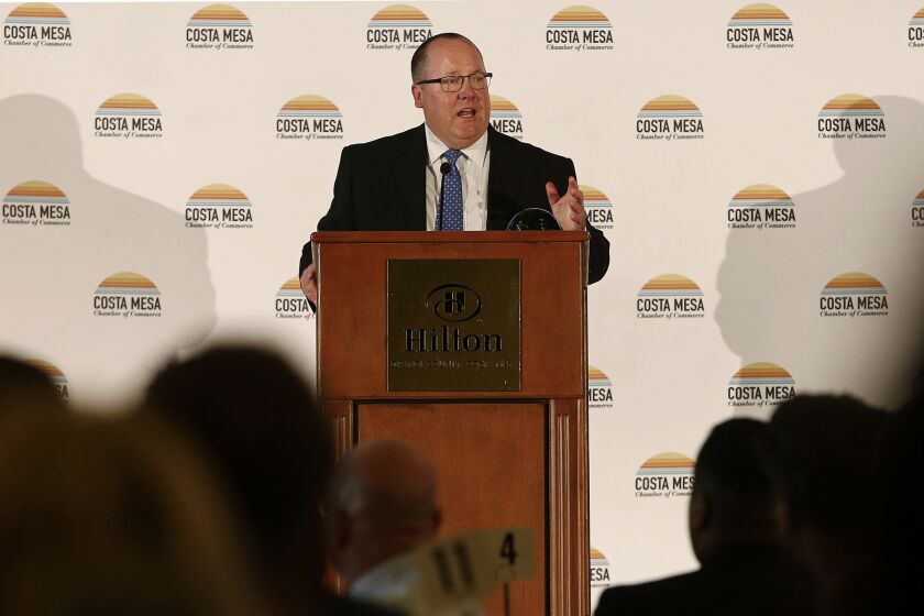 Mayor John Stephens speaks during the Costa Mesa Chamber of Commerce annual State of the City luncheon at the Hilton on Friday. (Kevin Chang / Daily Pilot)