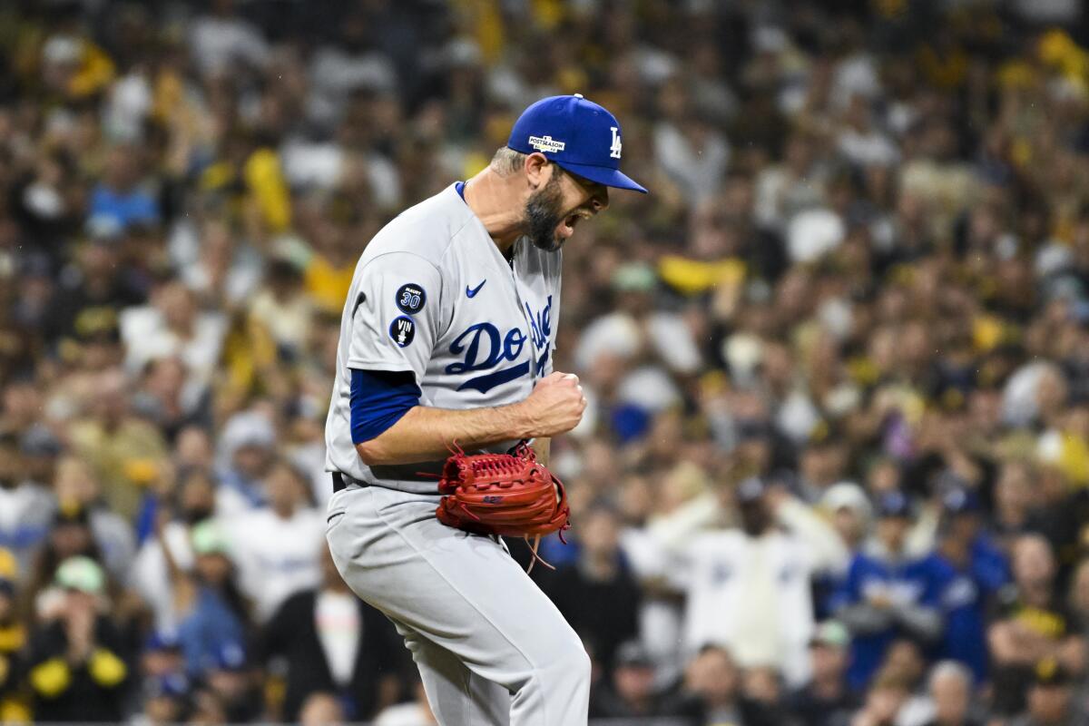 Dodgers relief pitcher Chris Martin reacts after a pitch during the sixth inning against the Padres on Saturday.