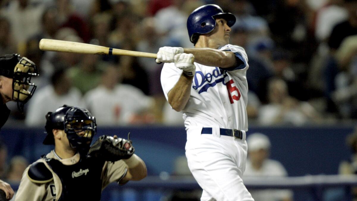 Shawn Green connects for a home run against the Padres during a Dodgers game on Sept. 13, 2004.
