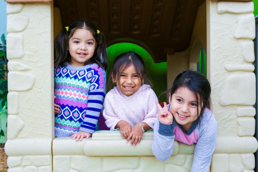 Children playing outside of a Children's Bureau location. (Courtesy Children's Bureau)