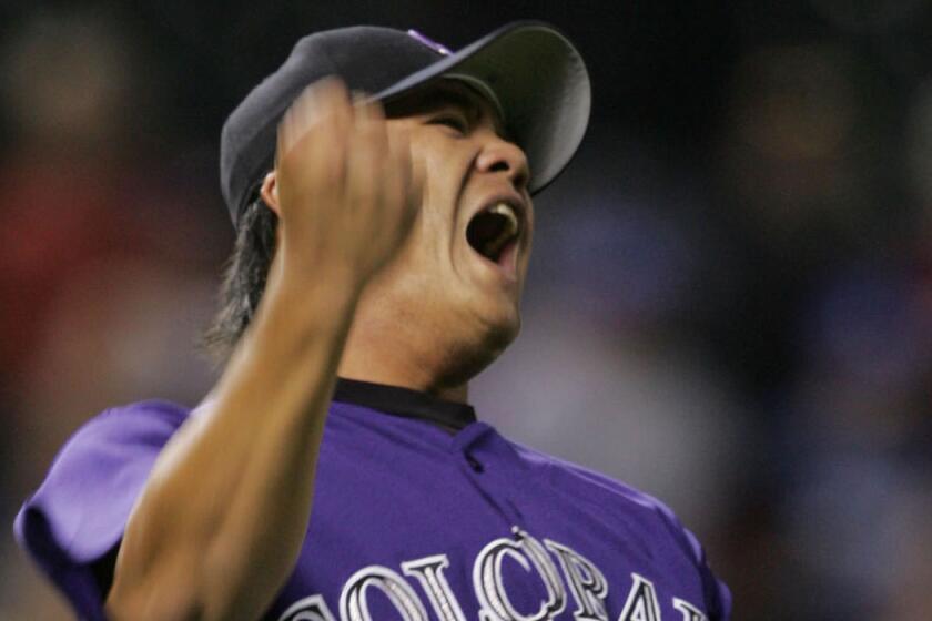 Colorado Rockies relief pitcher Chin-hui Tsao reacts during a 2005 game against the Dodgers.