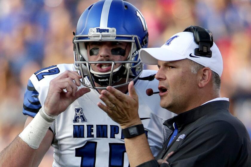 Memphis Coach Justin Fuente and quarterback Paxton Lynch have helped Memphis open the season 6-0.