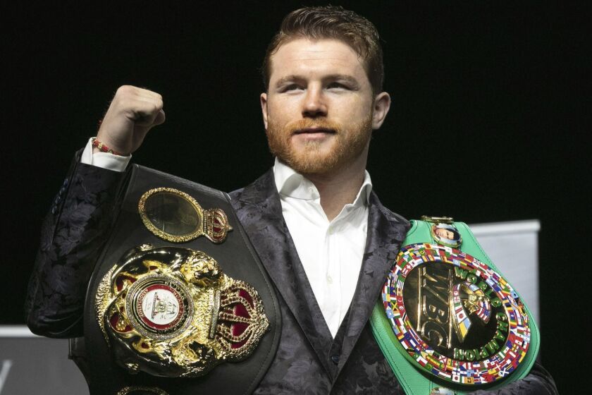 Boxer Canelo Alvarez poses for photos at Madison Square Garden in New York, Wednesday, Oct. 17, 2018. He will meet Rocky Fielding in a 12-round, super middleweight bout Dec. 15, 2018. (AP Photo/Richard Drew)