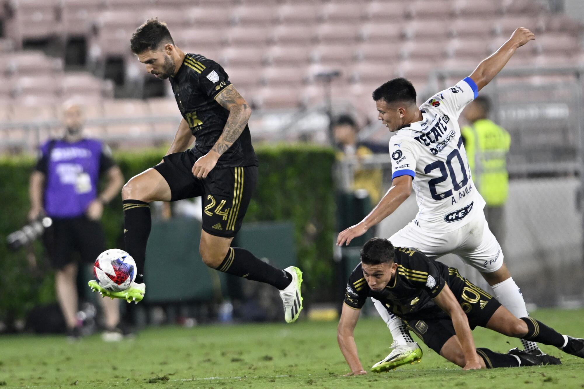 LAFC midfielder Ryan Hollingshead, left, controls the ball during a Leagues Cup match against Monterrey in August.