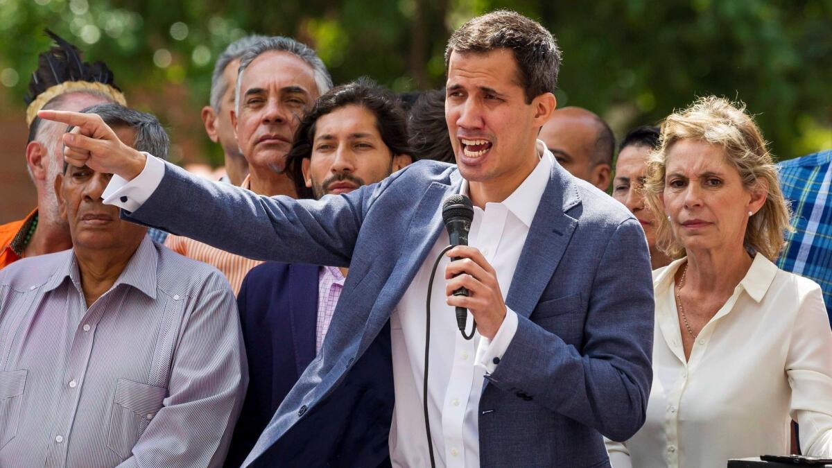 Juan Guaido, head of Venezuela's National Assembly, participates in a protest Jan. 11 to denounce the government of President Nicolas Maduro.