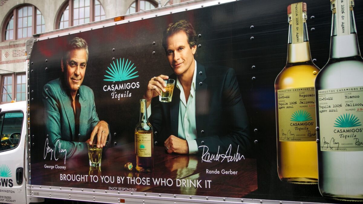 A delivery truck in Seattle features an ad promoting George Clooney and Rande Gerber's Casamigos Tequila.