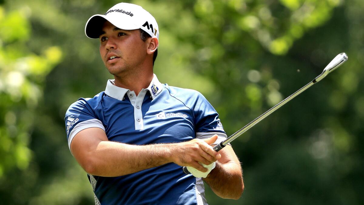 Jason Day watches his tee shot at No. 5 during the second round of the Bridgestone Invitational on Friday.