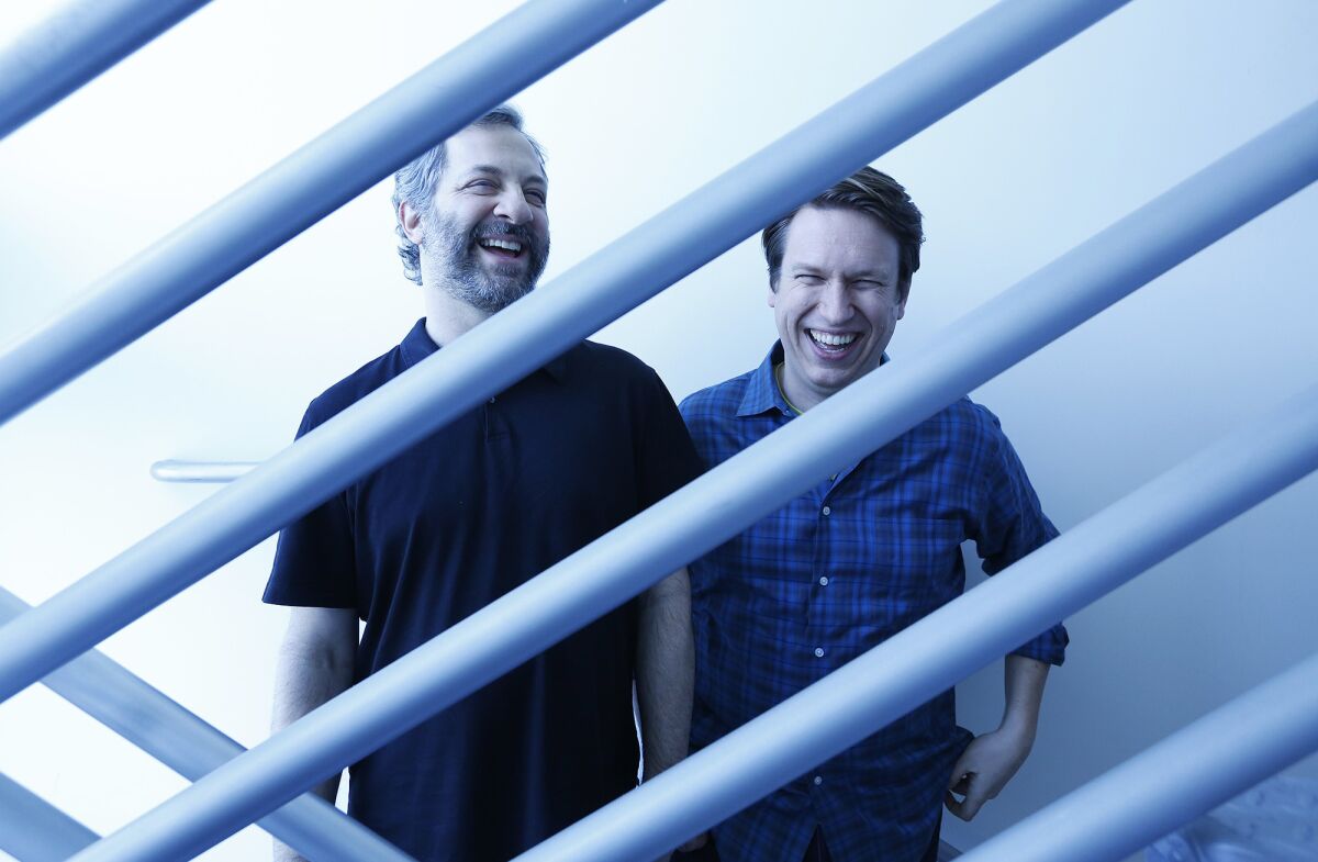 Judd Apatow, left, and Pete Holmes are the forces behind the new HBO series, "Crashing," which looks at Holmes' early career as a stand-up fresh from a divorce and trying to make it big.