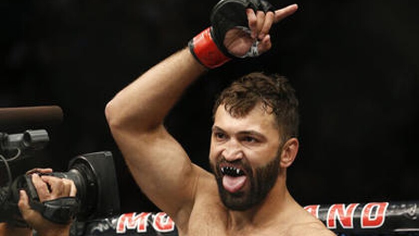 Andrei Arlovski gestures before fighting Frank Mir in a heavyweight mixed martial arts bout at UFC 191 on Sept. 5 in Las Vegas.