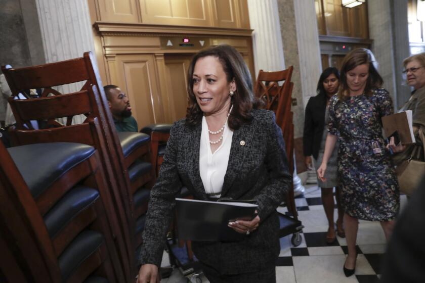 Sen. Kamala Harris, D-Calif., leaves the chamber as the Republican-run Senate rejected a GOP proposal to scuttle President Barack Obama's health care law and give Congress two years to devise a replacement, Wednesday, July 26, 2017, at the Capitol in Washington. President Donald Trump and Senate Majority Leader Mitch McConnell, R-Ky., have been stymied by opposition from within the Republican ranks. (AP Photo/J. Scott Applewhite)
