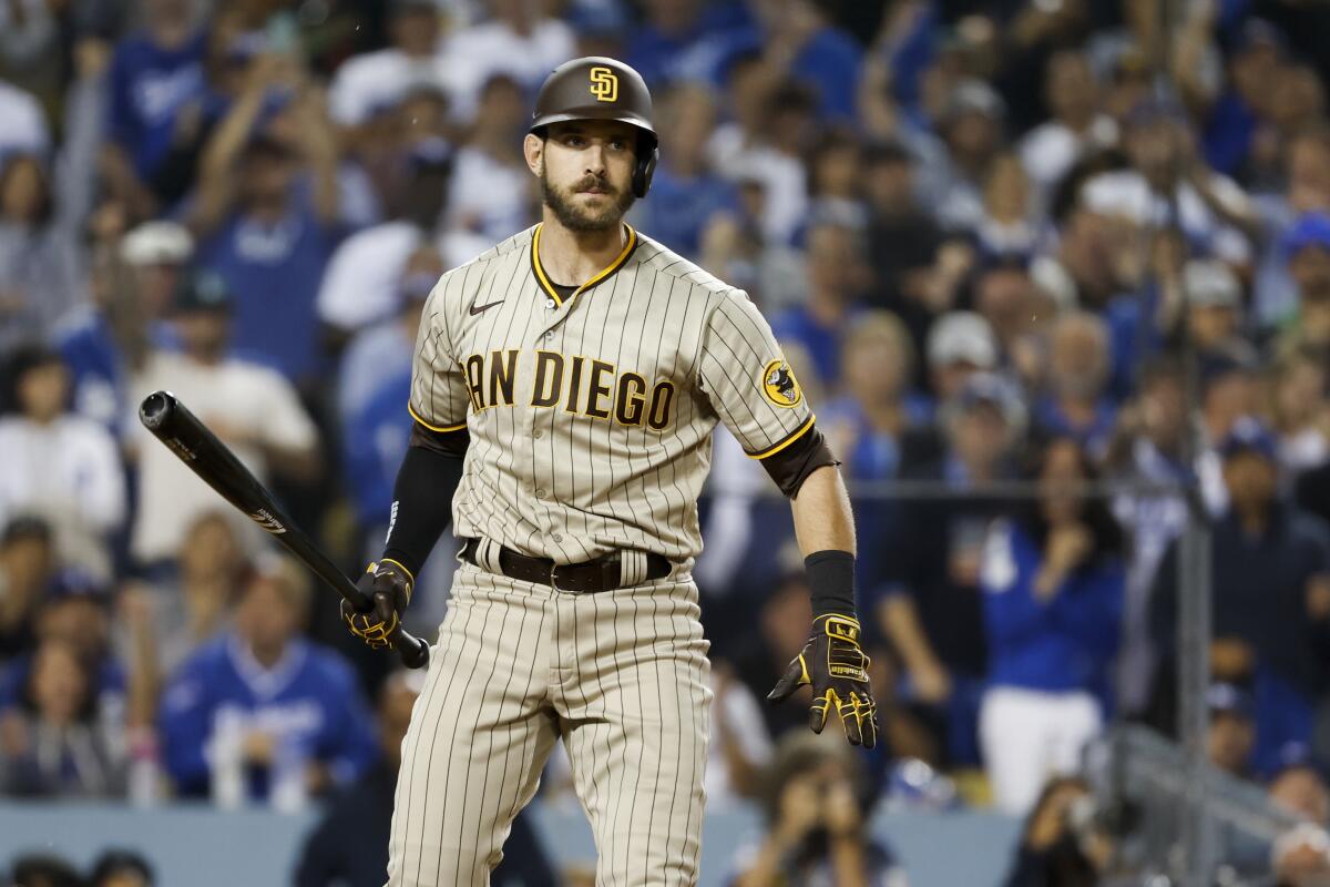 The Padres' Austin Nola (26) reacts after striking out during the seventh inning Tuesday night in Los Angeles.