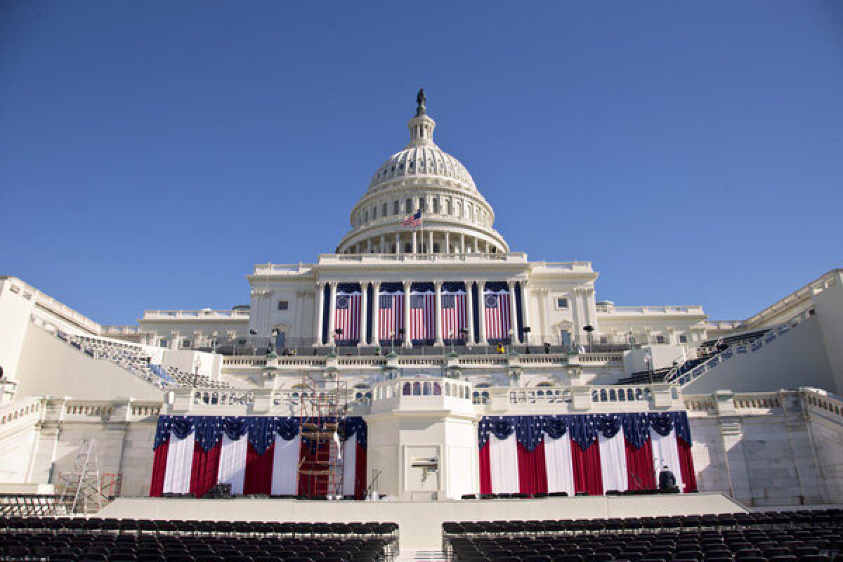 The West Front of the Capitol in Washington is dressed in red, white and blue ahed of the 57th Presidential Inauguration.