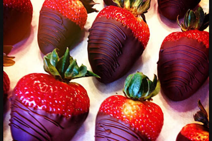 Chocolate-covered strawberries are photographed with an iPhone 4S.