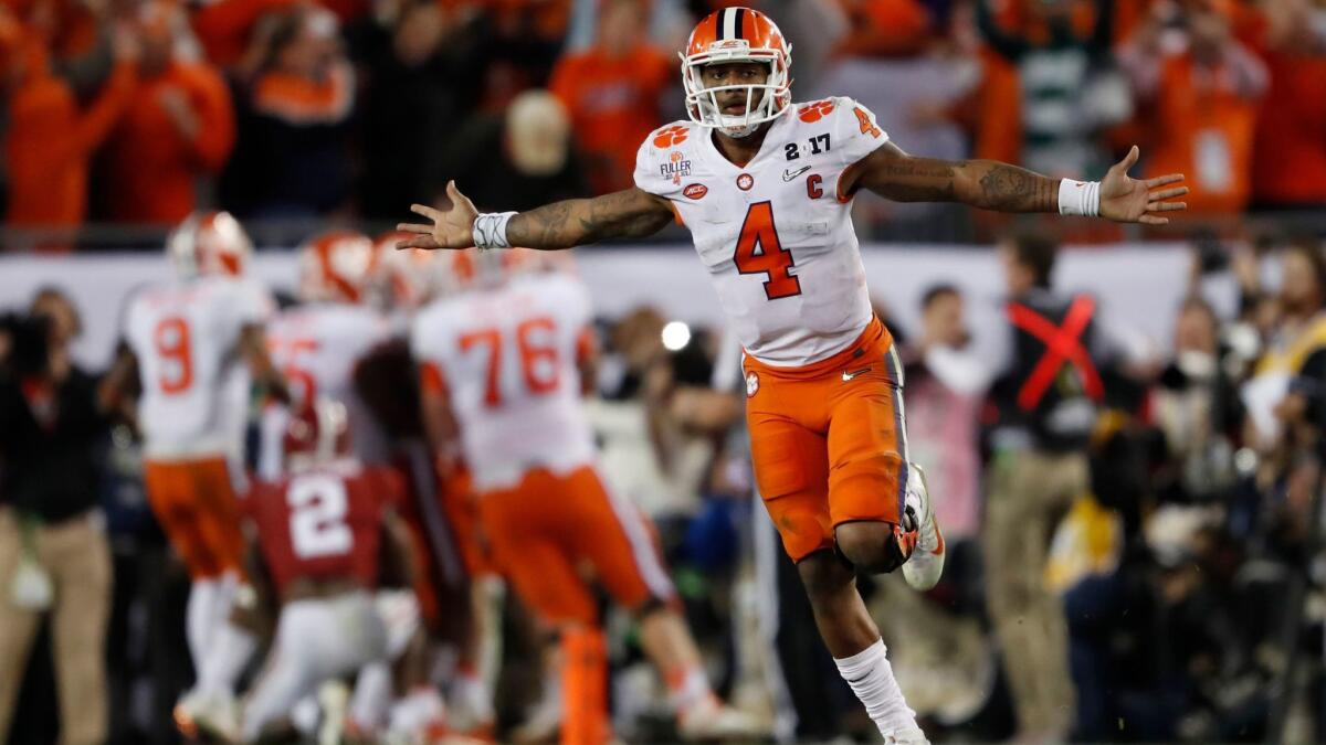 Clemson's Deshaun Watson celebrates a last-second touchdown pass to Hunter Renfrow against Alabama in the NCAA College Football Playoff championship game on Jan. 10, 2017.