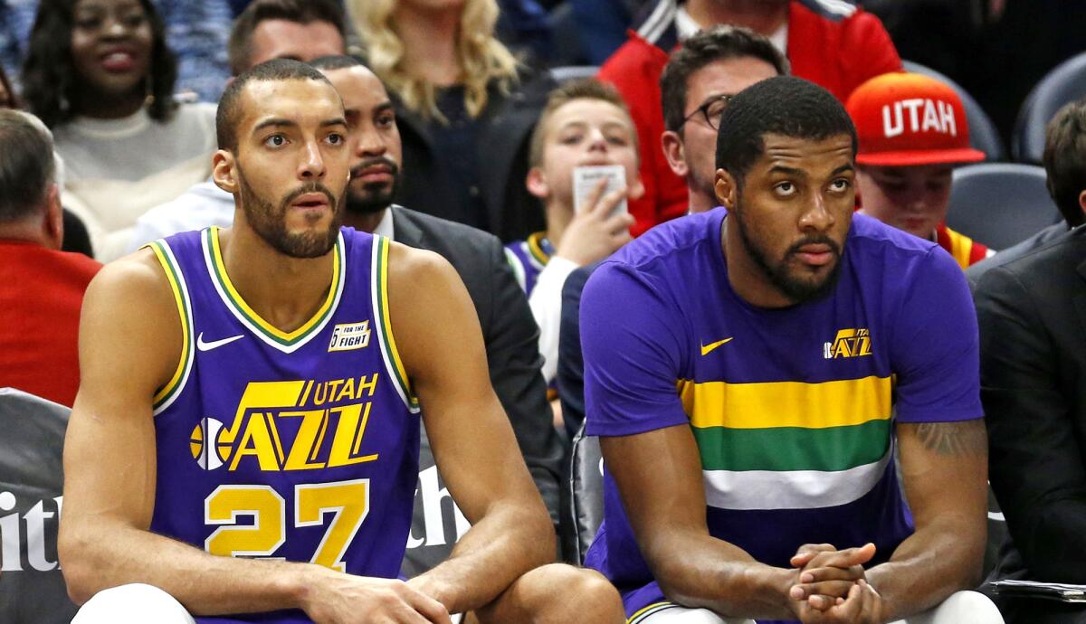 If center Rudy Gobert (27) and forward Derrick Favors don't help the Jazz find more offense, they could be on the outside looking in during the NBA playoffs.