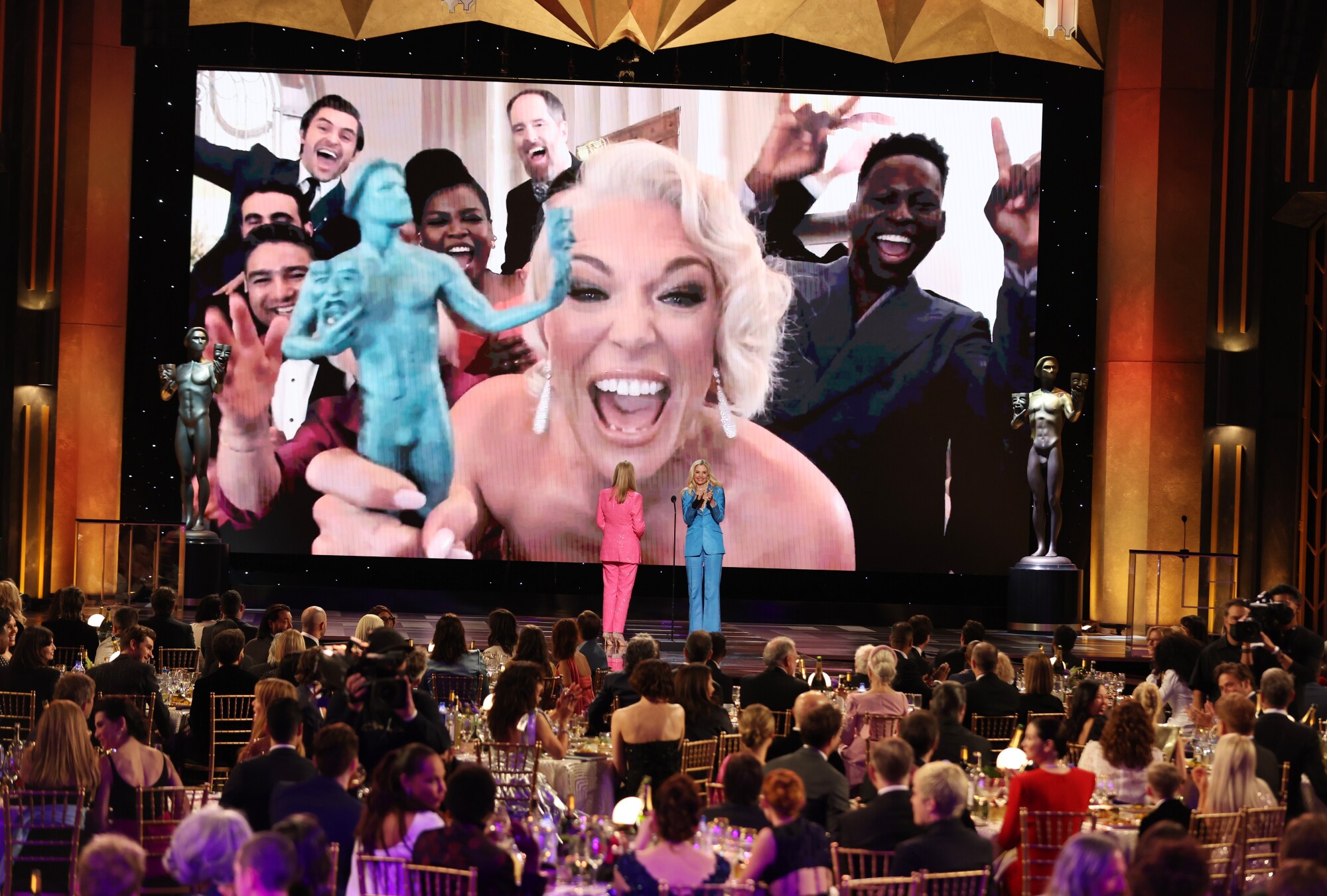 “Ted Lasso's” Hannah Waddingham and the cast are shown on screen celebrating the series' ensemble award