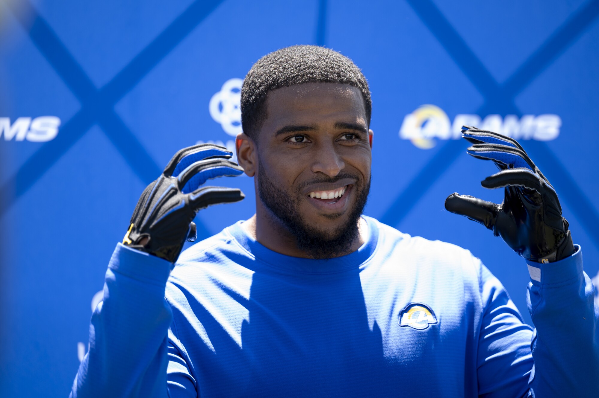 Rams linebacker Bobby Wagner answers questions after camp practice.