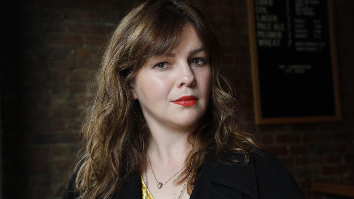 Amber Tamblyn photographed at Hartley's Bar in Brooklyn, New York. Her debut novel is "Any Man."