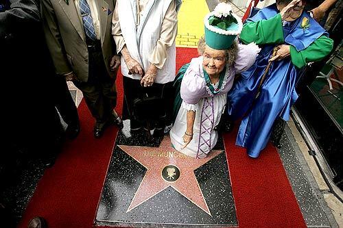 The seven surviving actors who portrayed munchkins in the classic 1939 film "The Wizard of Oz," were honored with a star on the Hollywood Walk of Fame. Margaret Pellegrini points to the newest addition on the block.