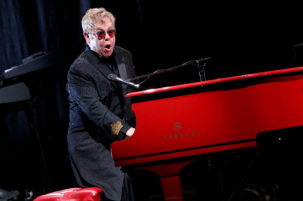 Elton John gets animated during a Jan. 12 performance at the Wiltern Theatre in Los Angeles.