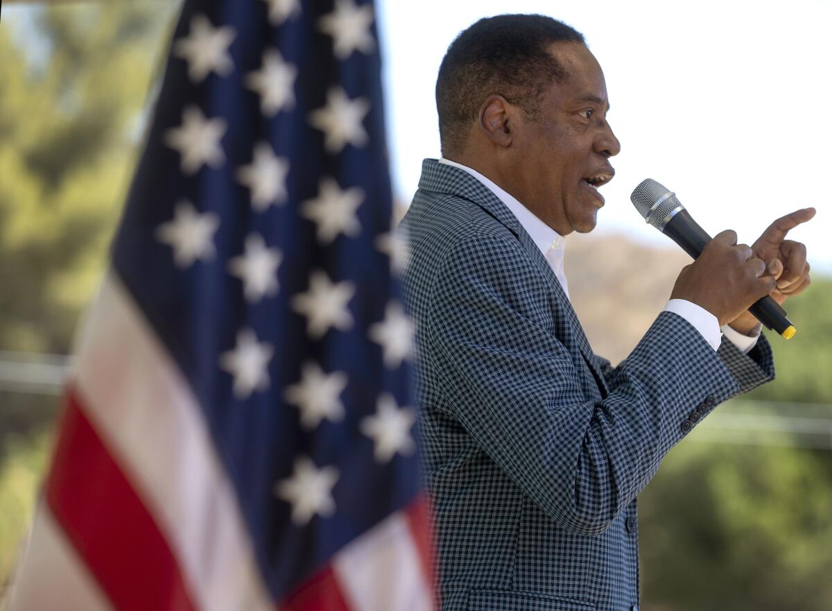 Larry Elder speaks at a rally