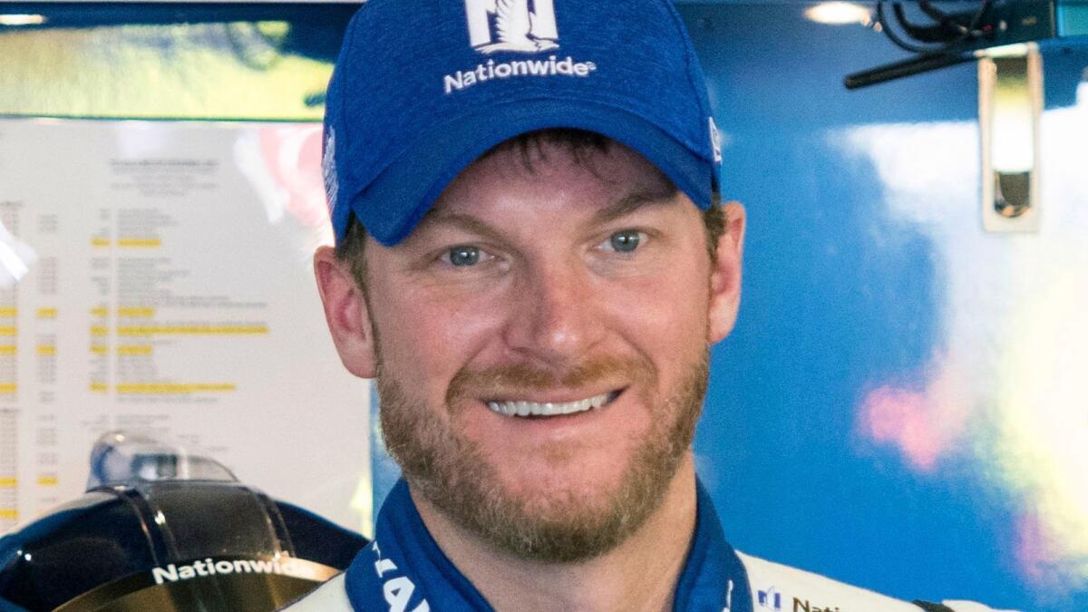 Dale Earnhardt Jr. appears at the NASCAR Monster Energy Cup in Hampton, Ga., on March 3, 2017. Hendrick Motorsports says Earnhardt will retire at the end of this season.