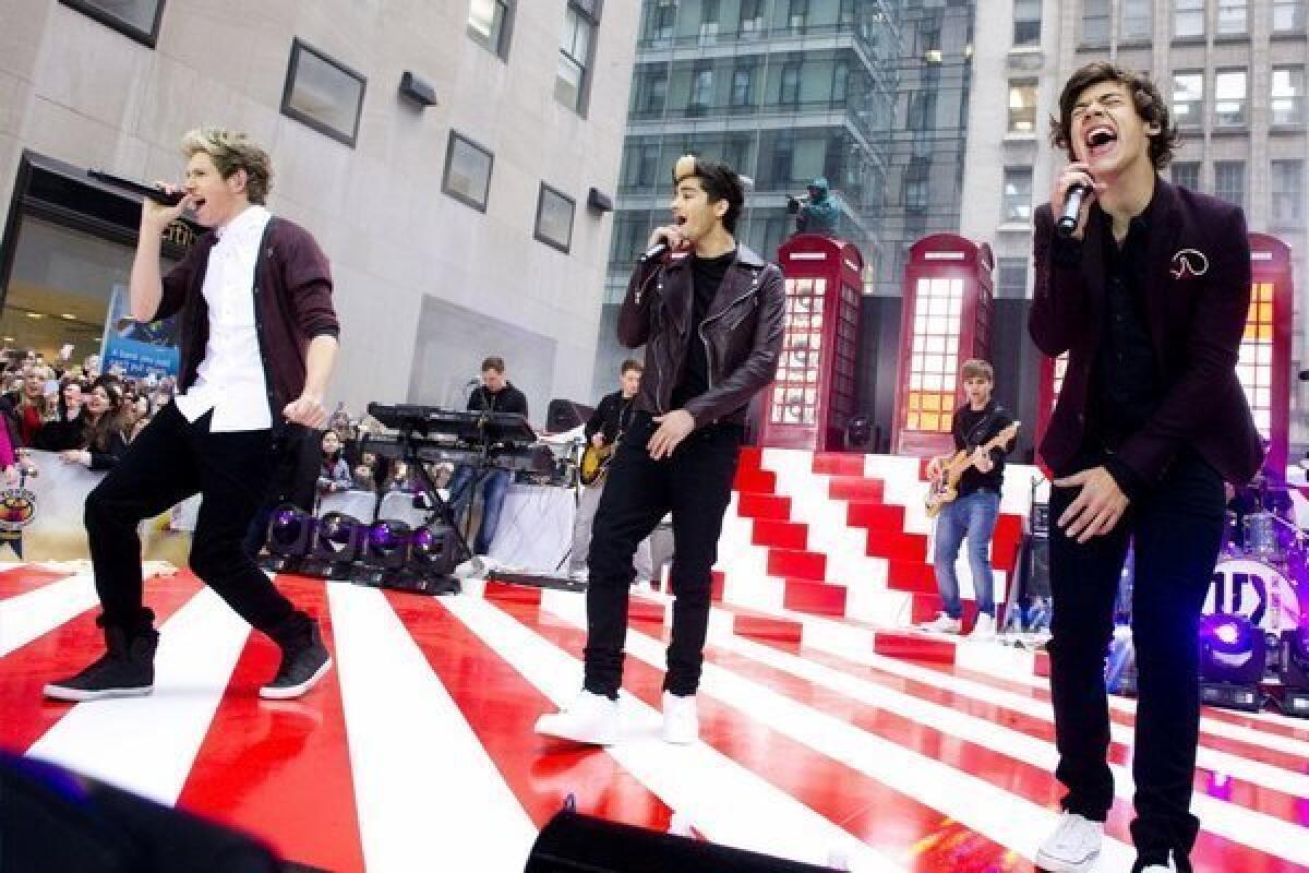 Members of One Direction -- from left, Niall Horan, Zayn Malik and Harry Styles -- perform on NBC's "Today" show.
